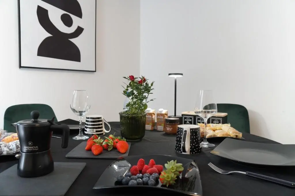 Zona colazione e cucina di Rudiae Palace Lecce